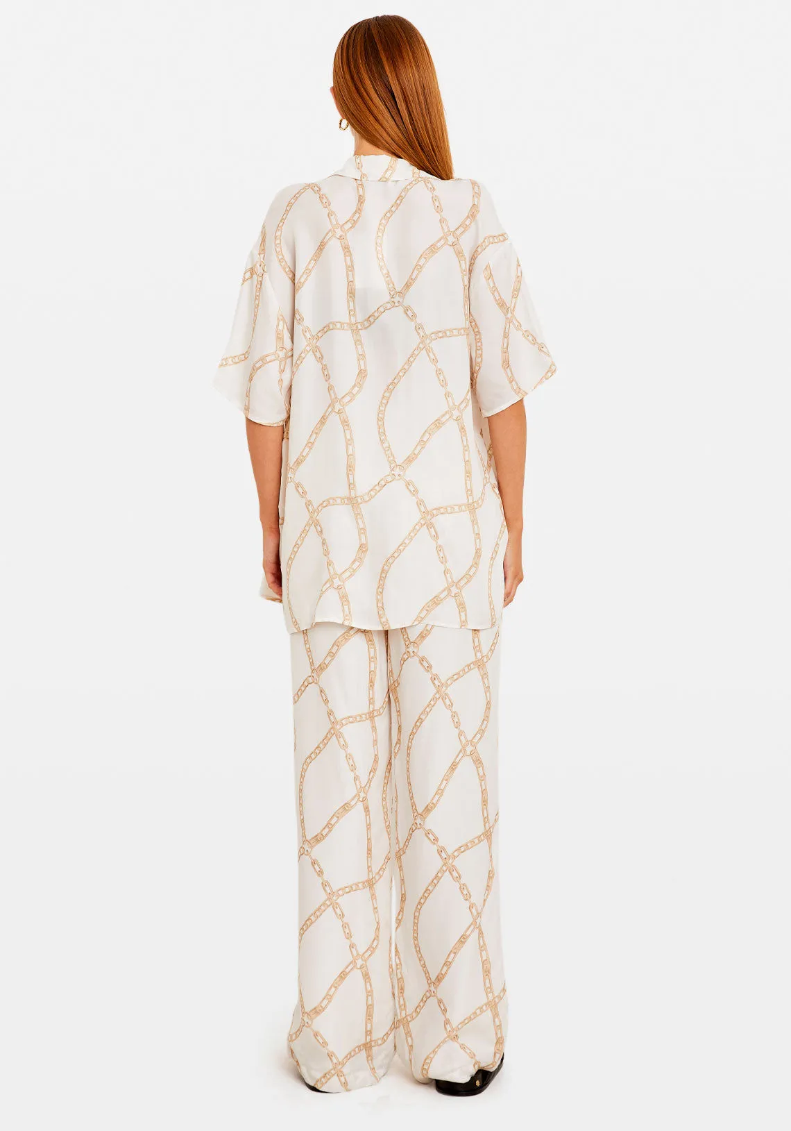 CARRIE PANT CREAM AND TAN LINK PRINT