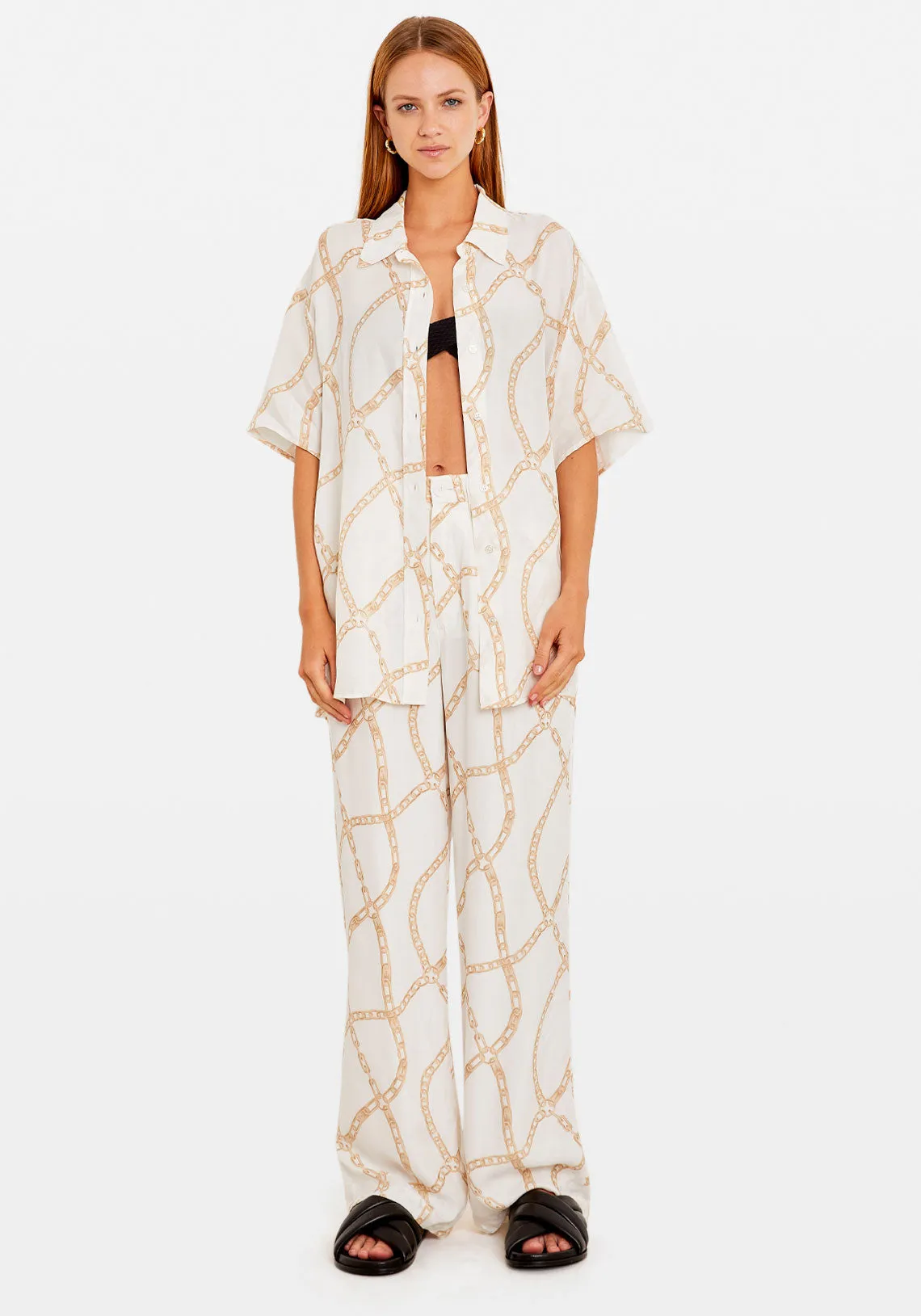 CARRIE PANT CREAM AND TAN LINK PRINT