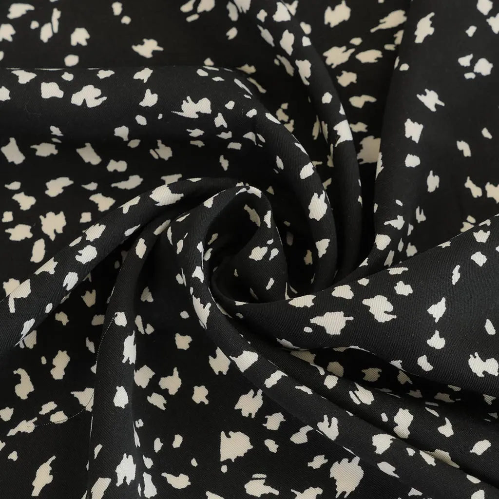 Linz- Black Animal Elements Viscose Woven Twill Fabric Sample