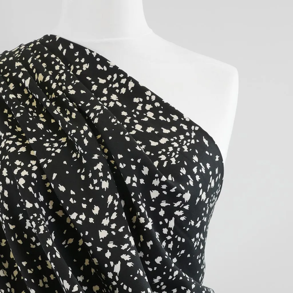 Linz- Black Animal Elements Viscose Woven Twill Fabric Sample